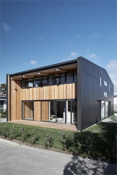 Metro Series windows and doors line this prefab home