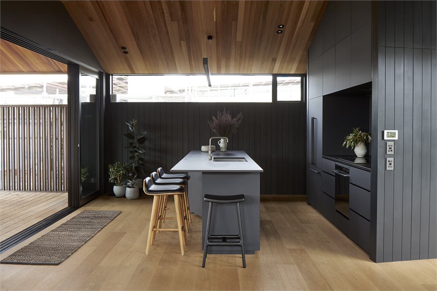 Celestory Metro Series windows shed light on the kitchen while preventing prying eyes.