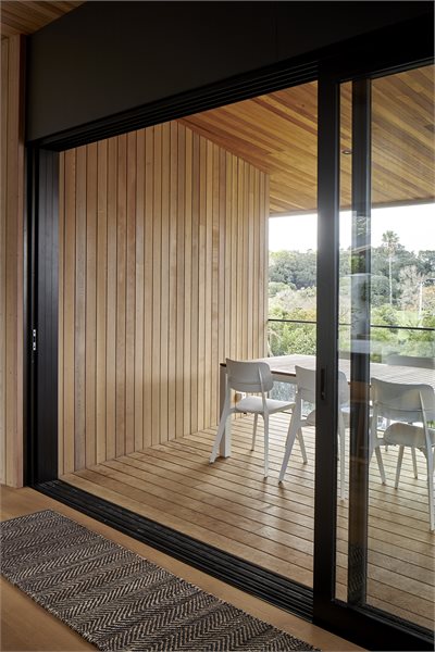 The box-like deck off the kitchen offers welcome shade in the height of summer.