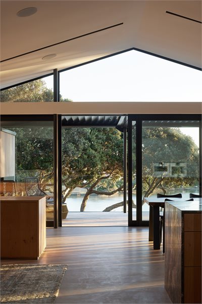 Modern living area with APL Architectural Series Sliding Doors and Metro Series Custom Windows